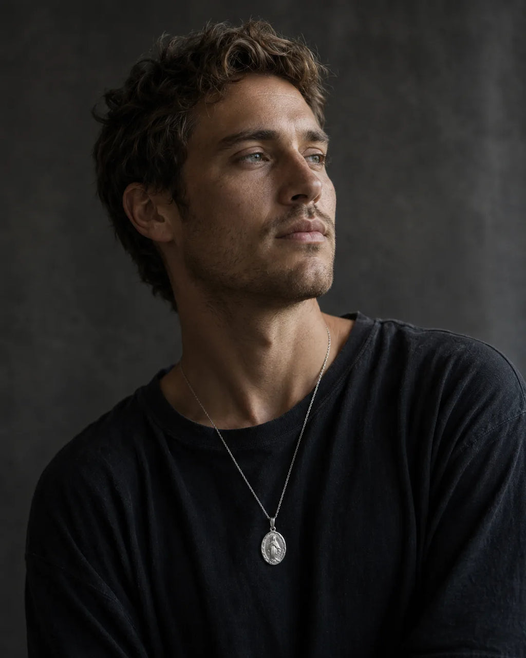 Virgin Mary Pendant — silver, worn by male model