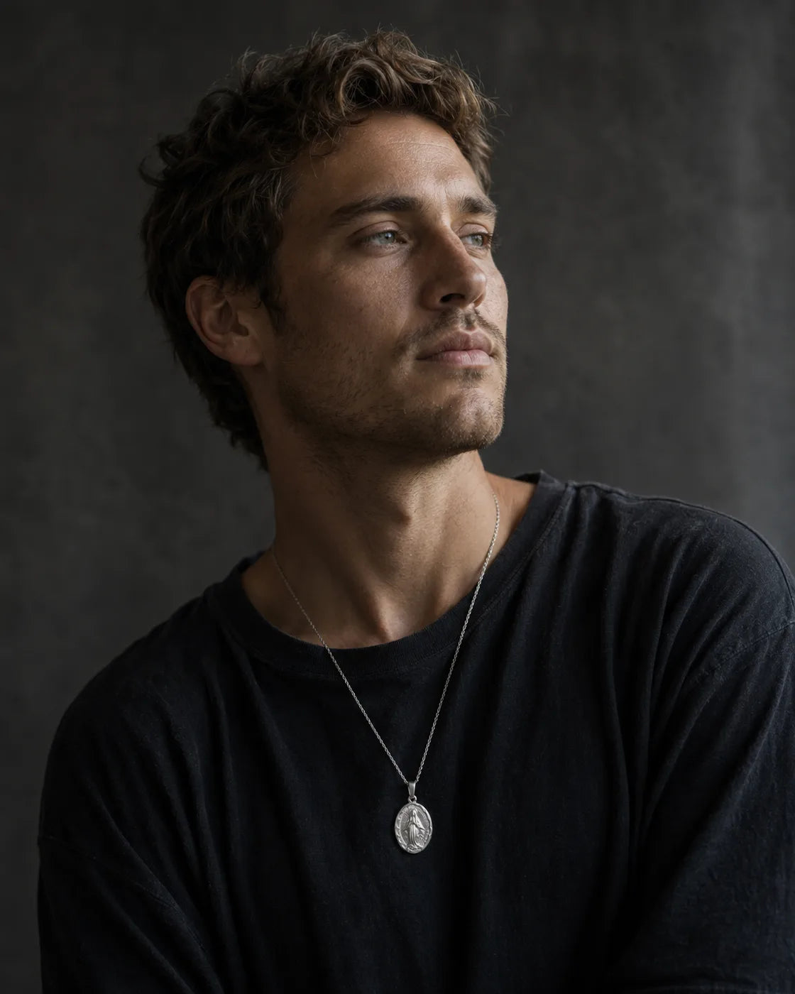Virgin Mary Pendant — silver, worn by male model